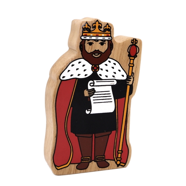 A wooden toy King wearing a crown and cape