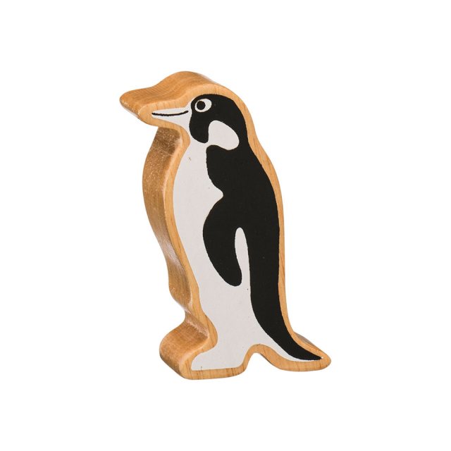 A chunky wooden painted black/white penguin toy figure in profile with a natural wood edge