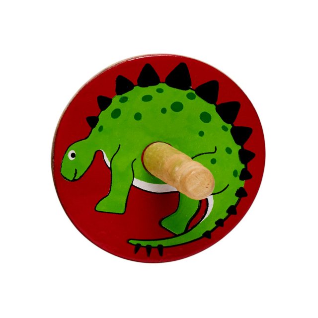 birds eye view of a red spinning top with a design of a stegosaurus dinosaur