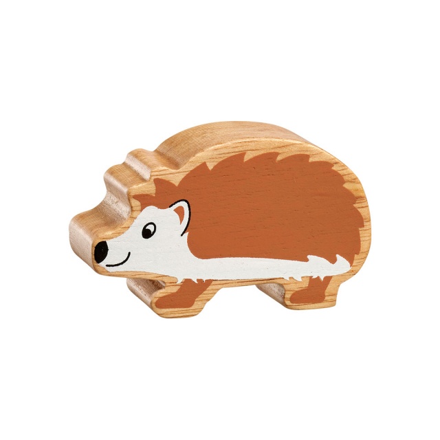 A chunky wooden brown and white hedgehog toy figure with a natural wood edge