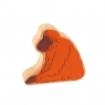 A chunky wooden orange orangutan toy figure in profile