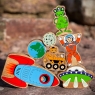 A stack of assorted wooden toy space themed characters in profile