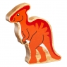 A wooden toy orange parasaurolophus dinosaur in profile with a natural wood grain edge
