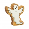 A chunky wooden white toy ghost figure in profile with a natural wood edge