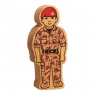 A chunky wooden brown army officer toy figure with a natural wood edge